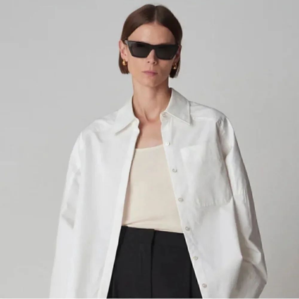 Co Essentials White Pocket Button Up Shirt $625